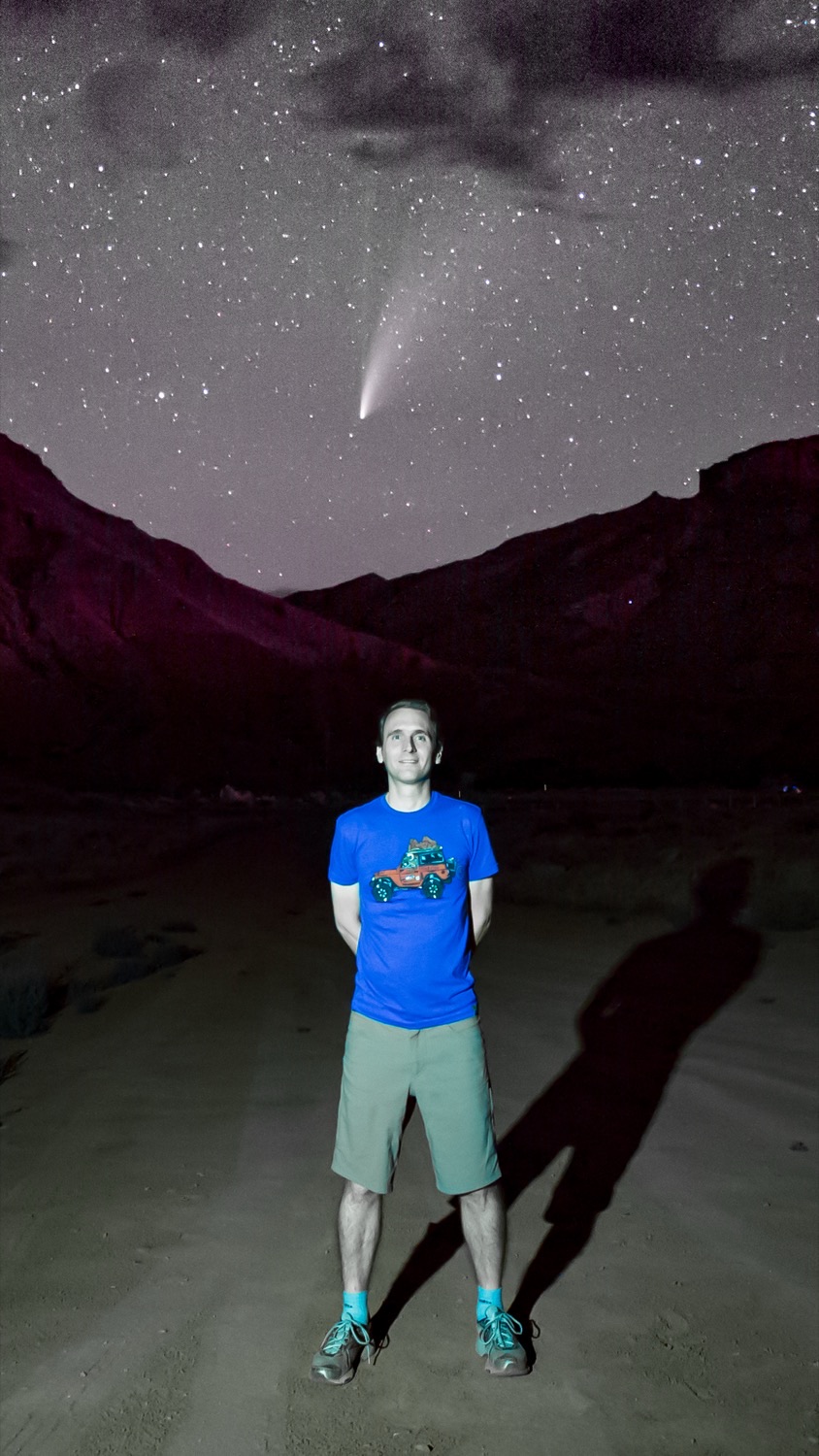 Daniel Branco beneath the night sky with comet NEOWISE in the American West