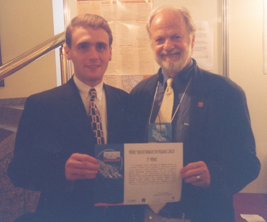 Daniel Branco receiving Best Clinical Research at the 2002 Latin American Congress of Epilepsy, with Jerome Engel of UCLA